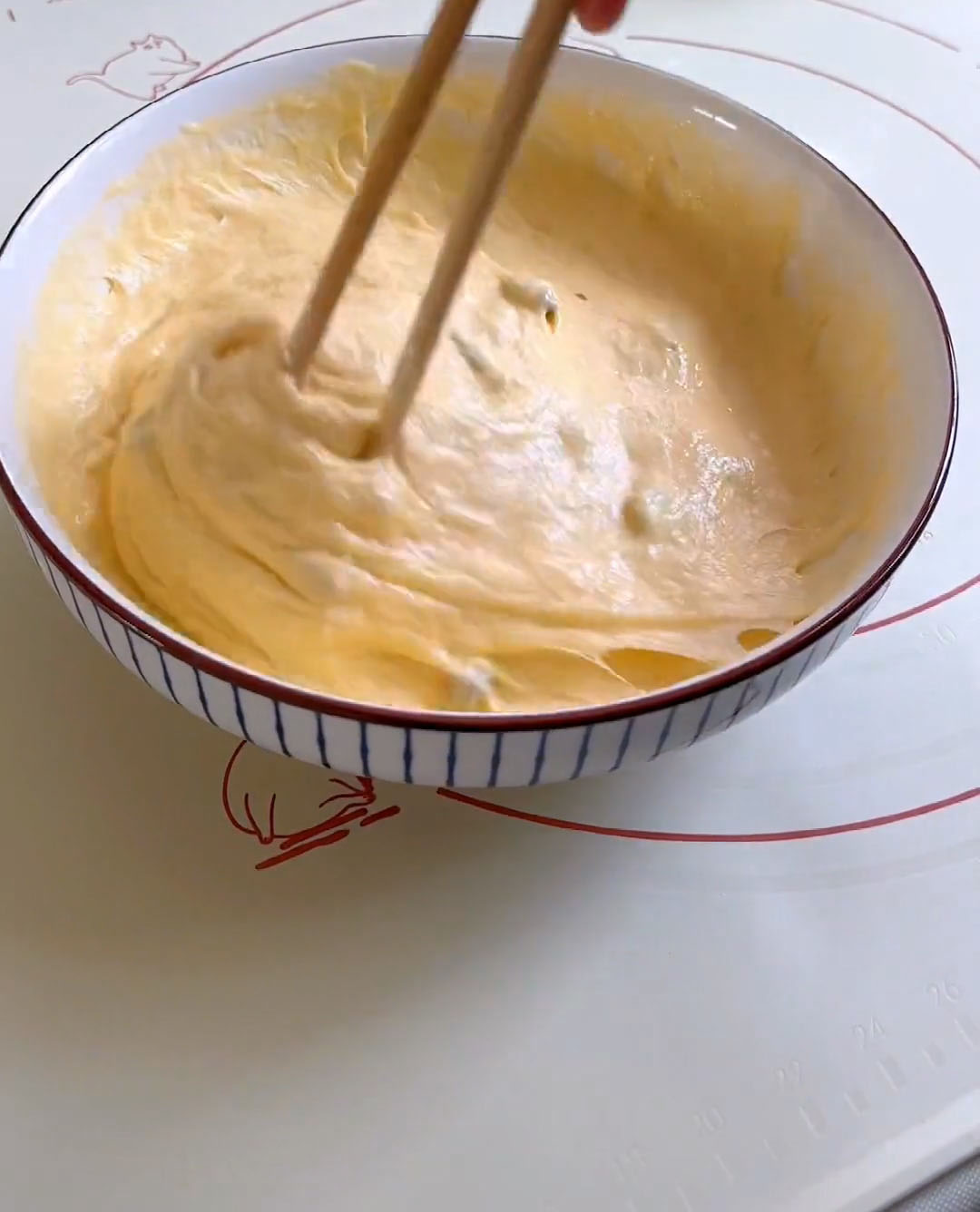 Using your whisk or a spatula, gently stir the batter for about 10 15 seconds