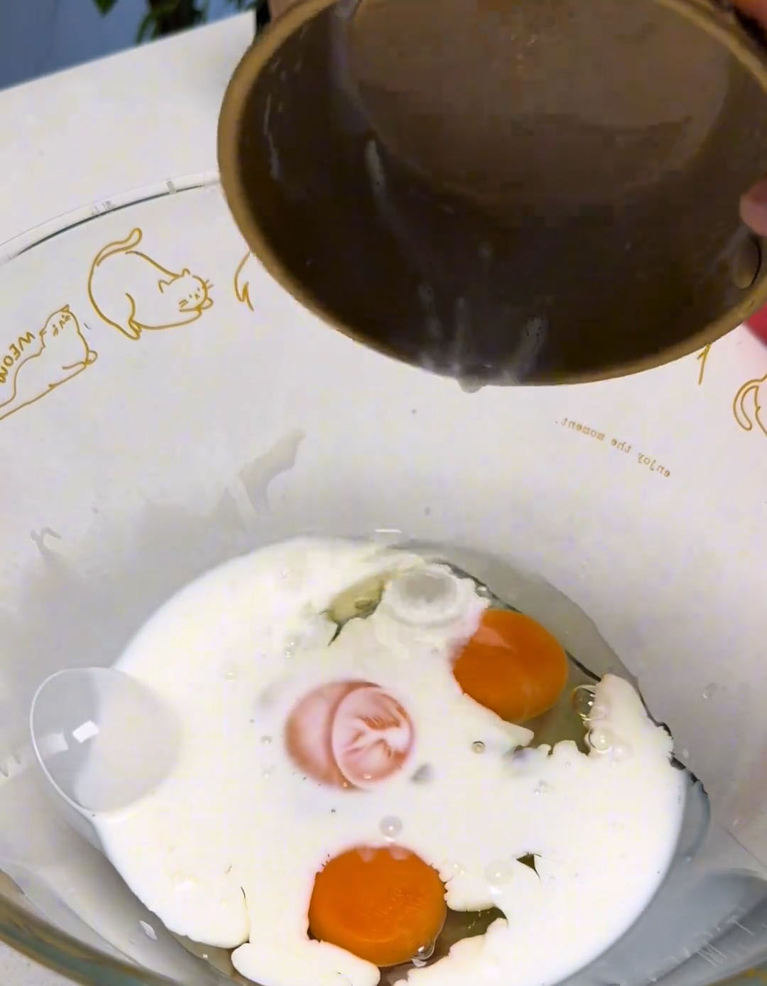 add the eggs and milk and stir well using chopsticks