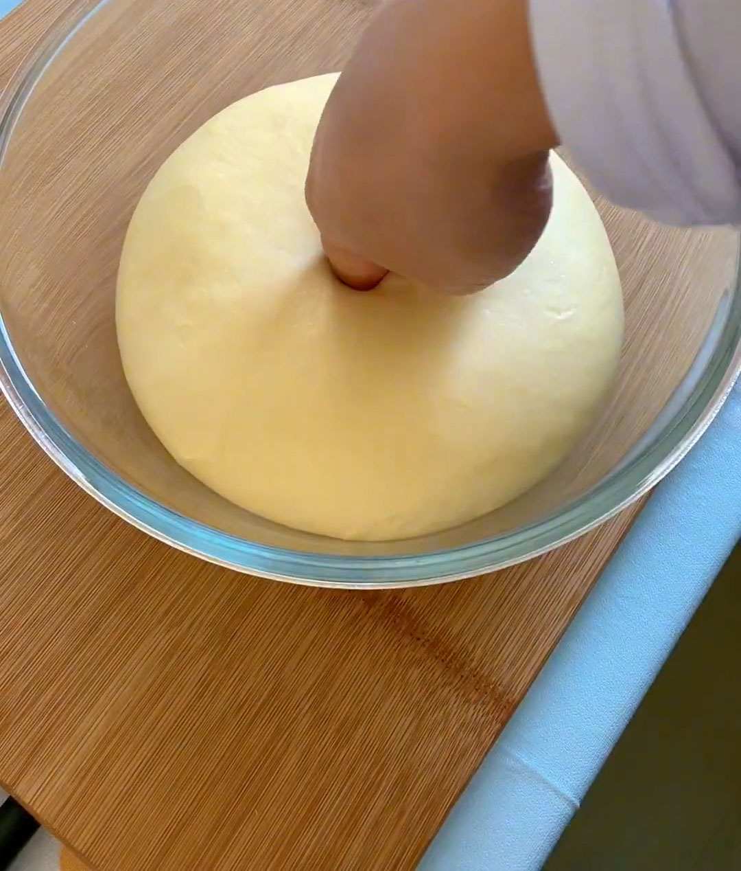 flour your finger and poke the dough