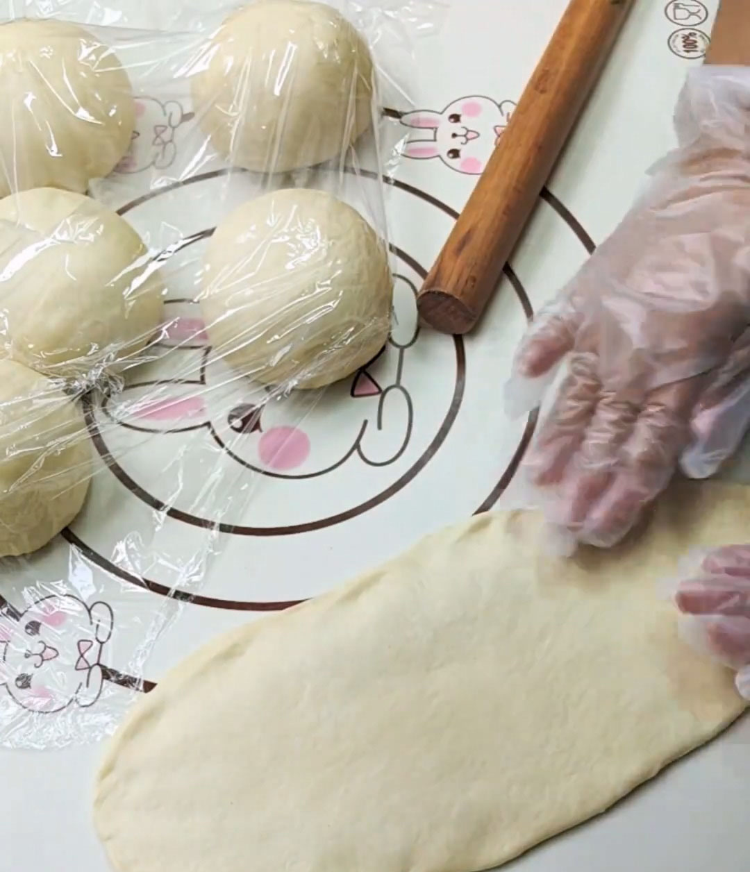 gently pressing the edges to release air