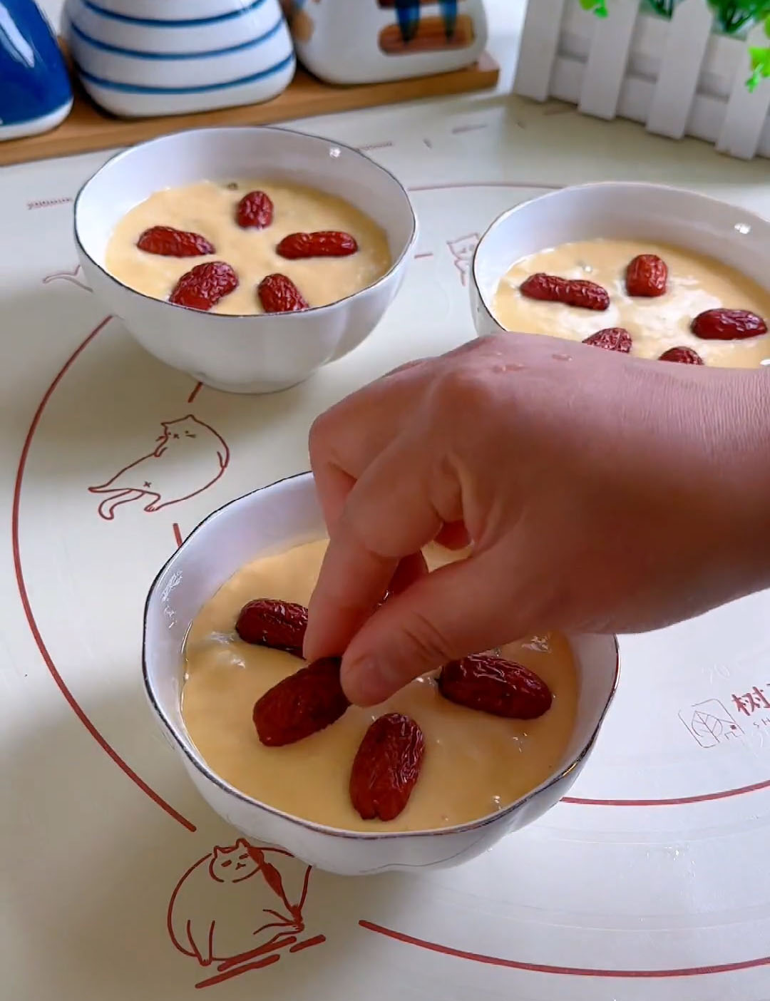 place 5 red dates (jujubes) into the batter