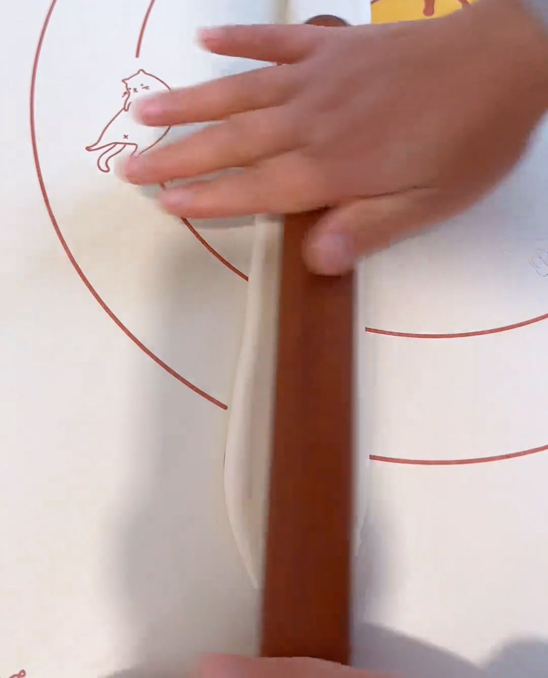 roll with a rolling pin to about 5 cm wide