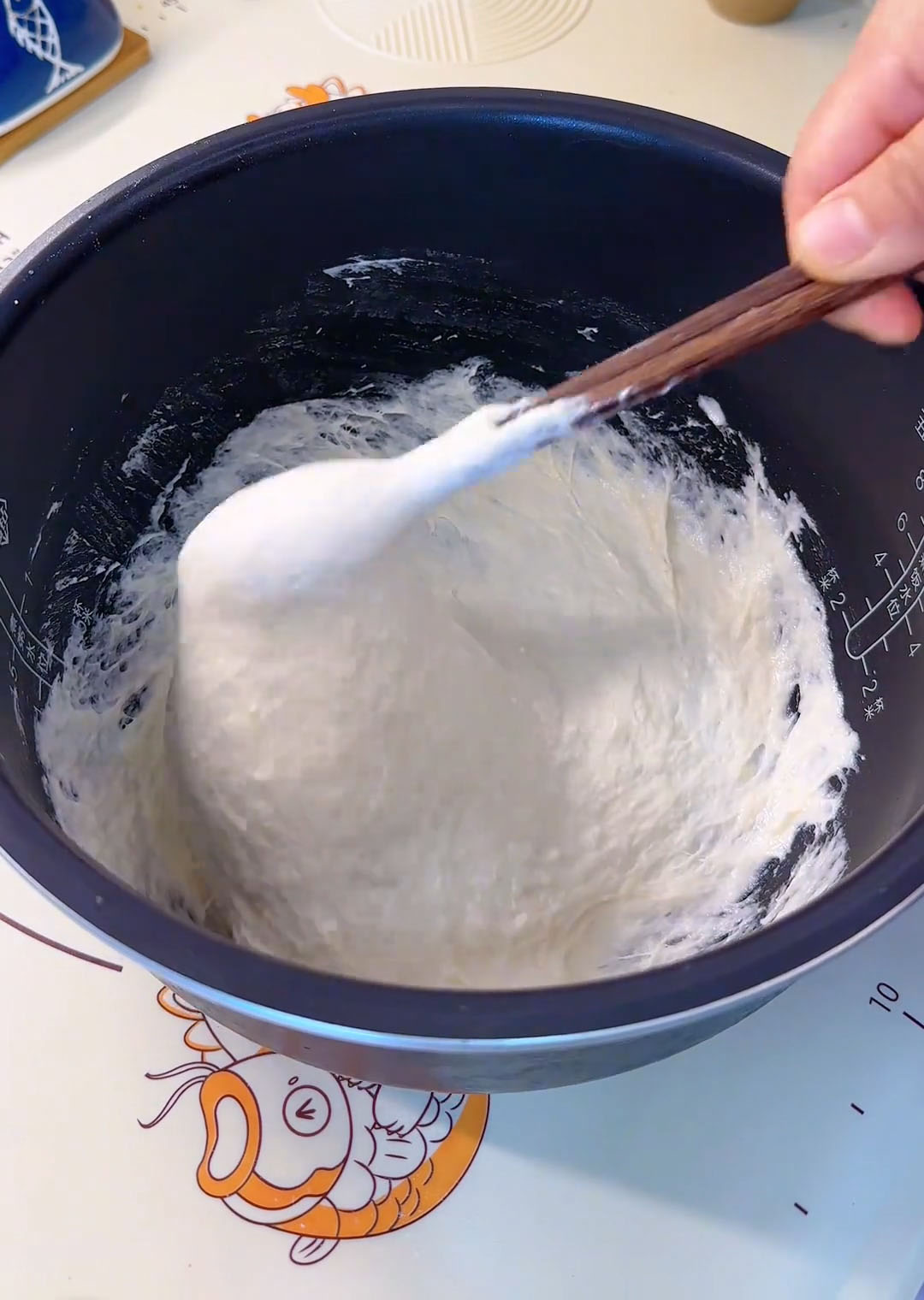 stirring continuously with chopsticks stirring continuously with chopsticks