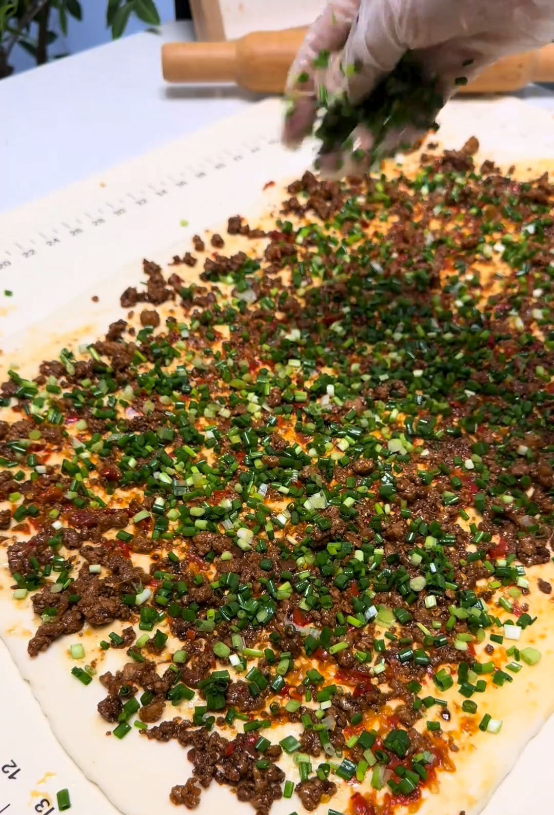 then chili paste and sprinkle scallions