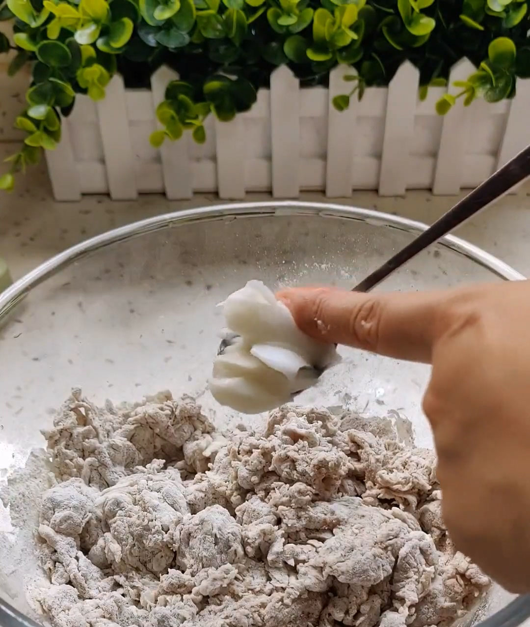 Add the spoonful of lard (or oil) to the bowl