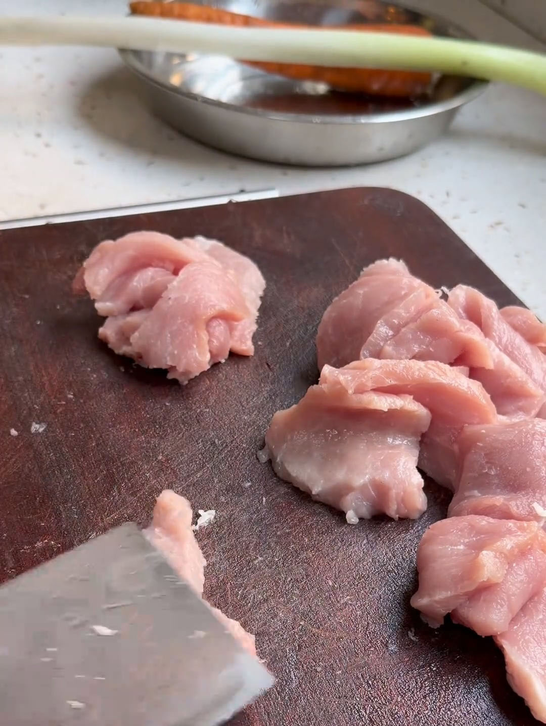 Gently pound each slice with the back of a knife