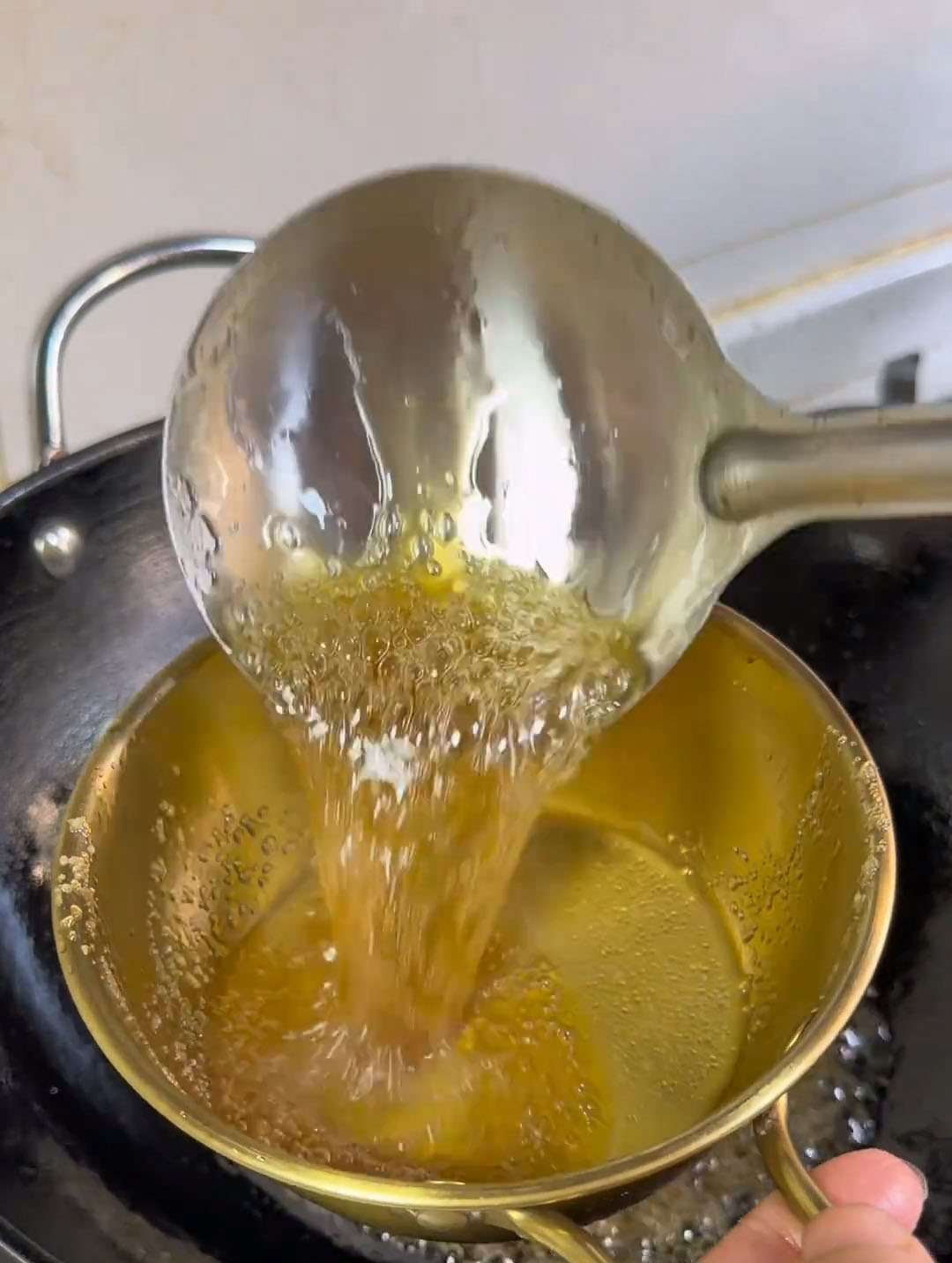 spoon a portion of the sauce into a small bowl and set it aside